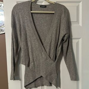 Thermal top that wraps around the front